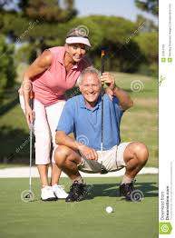 senior golf couple